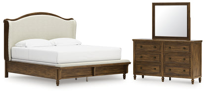 Sturlayne King Upholstered Panel Bed with Mirrored Dresser