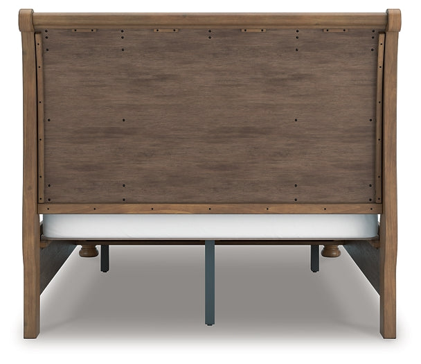 Feddinger Queen Storage Sleigh Bed with Mirrored Dresser and Chest